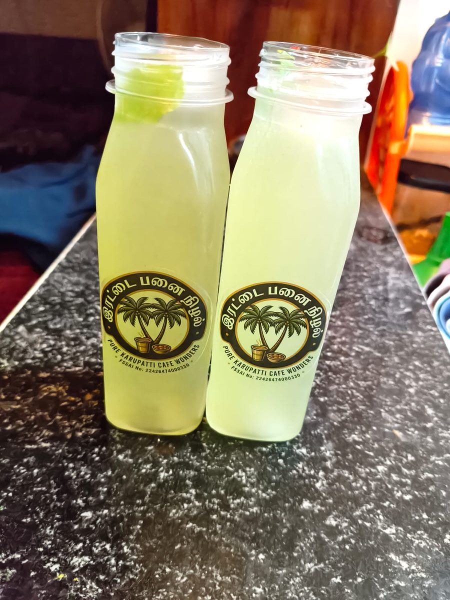 Irattai Panai Nizhal Lemon Mint juice bottles with fresh mint leaves on top — branded labels